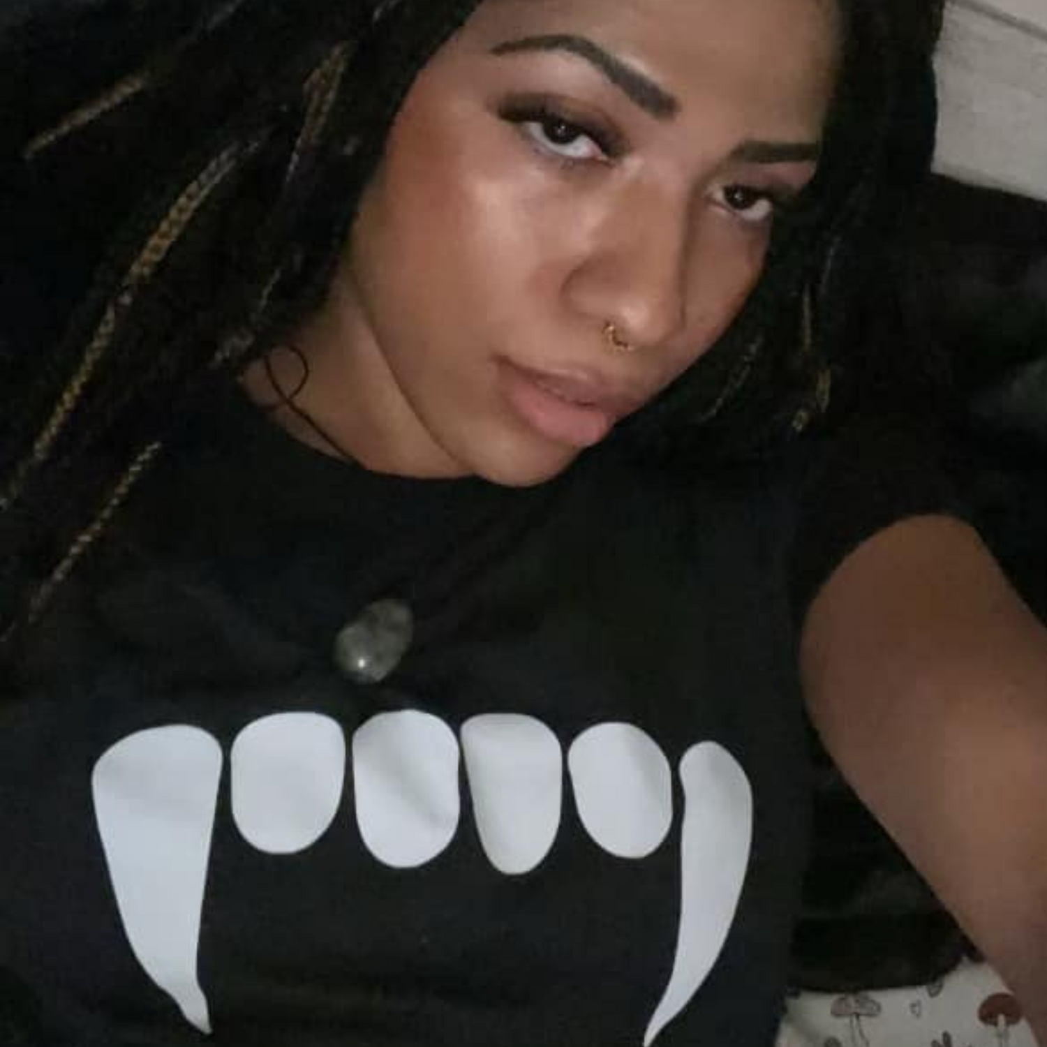 Black Woman Wearing Fangs Vampire Tshirt from Alicia McCalla's I Slay Vampires Collection